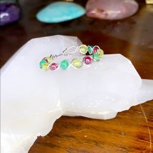 African jade, peridot, and garnet ring